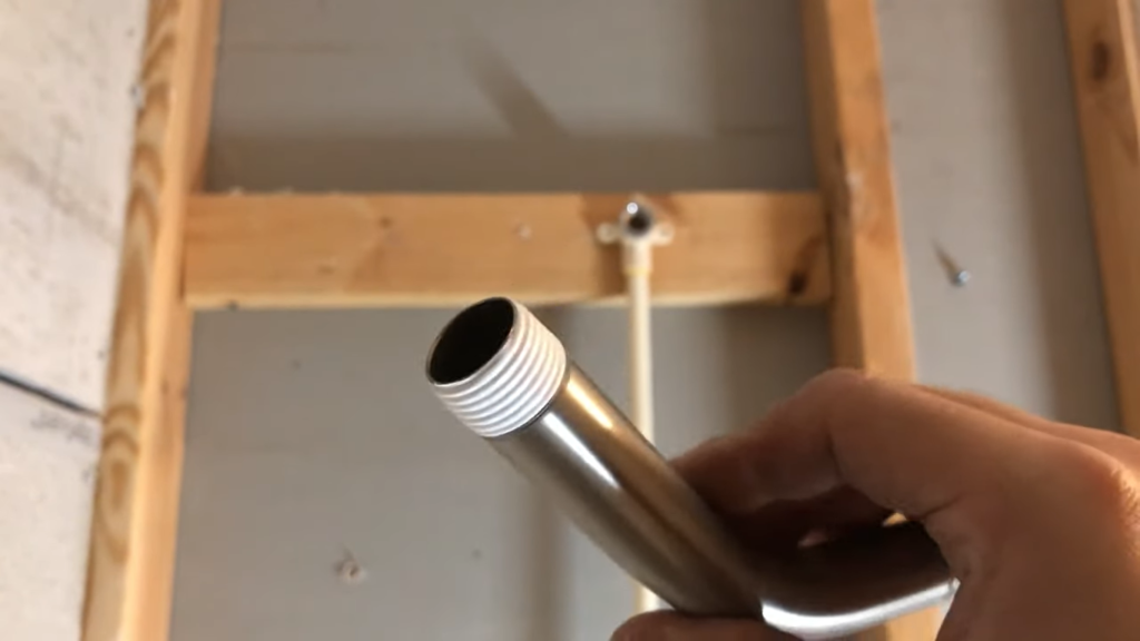 attach the shower pipe with the shower fitting