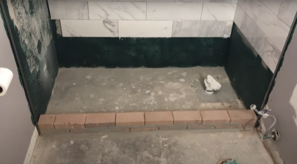 how to remove bathroom floor tile