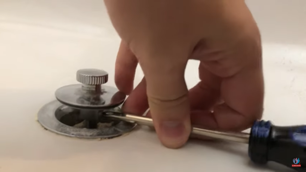how to remove bathtub drain plug