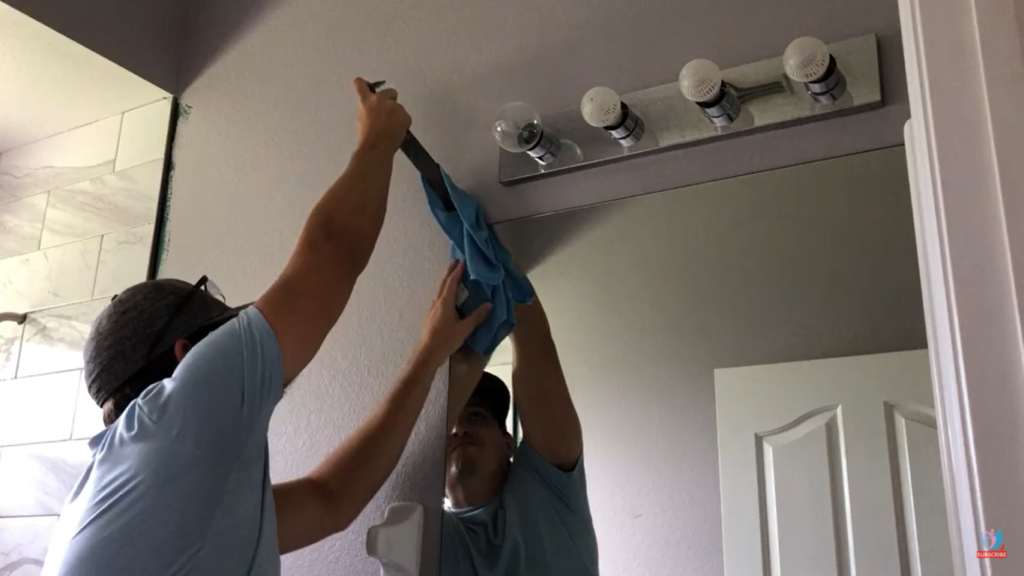 How to remove a bathroom mirror?